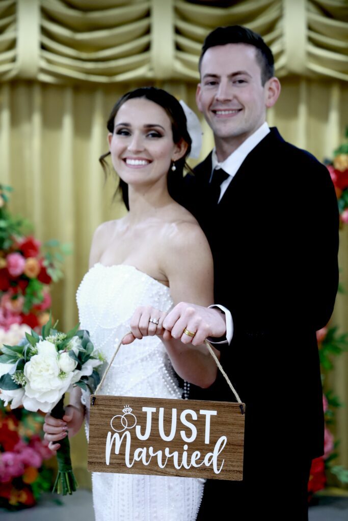 Traditional wedding ceremony in Las Vegas chapel with bride and groom