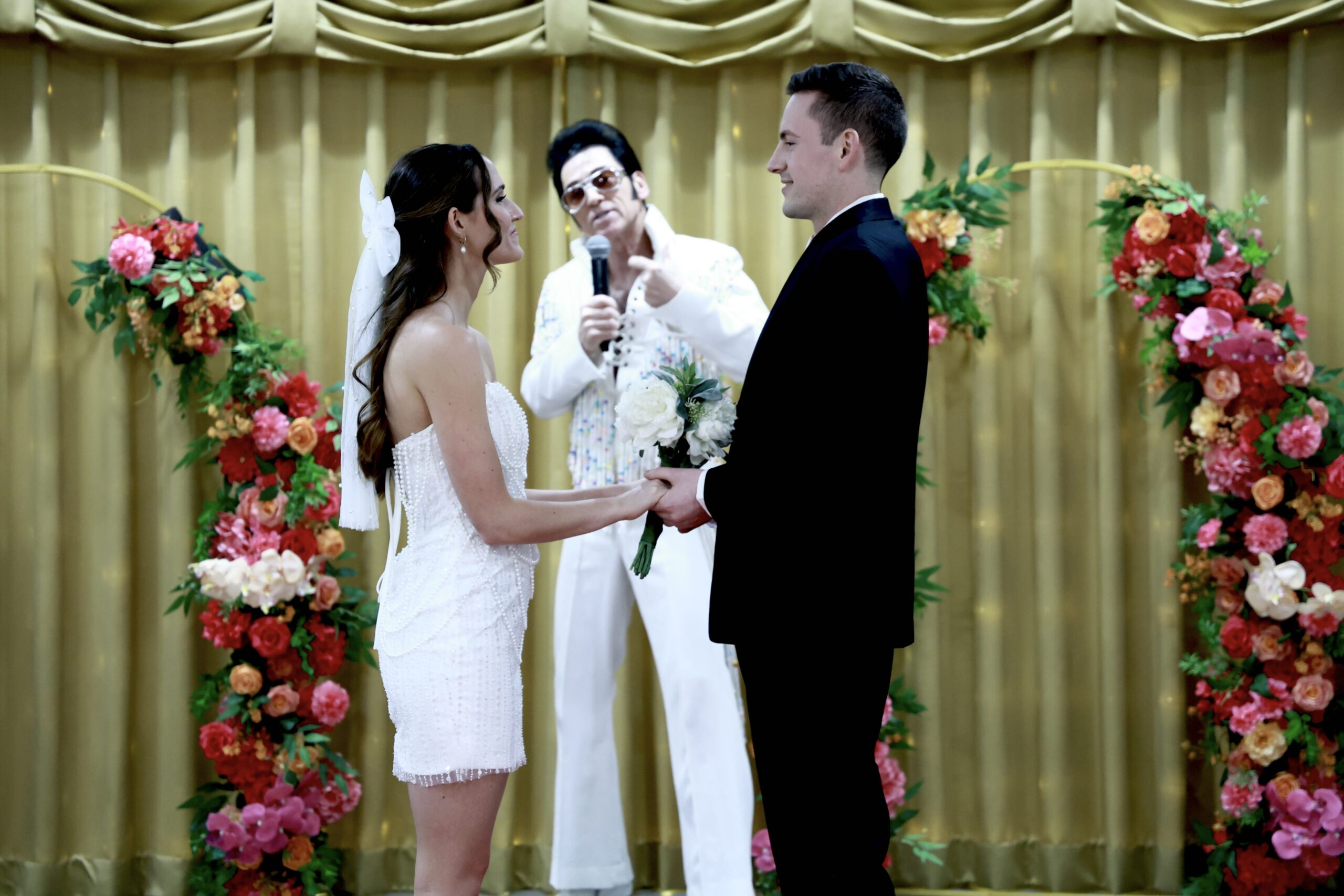 Bride and groom with Elvis